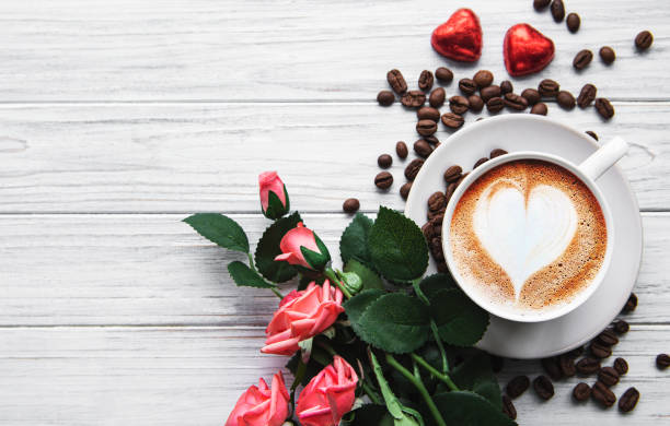 istock A cup of coffee with heart pattern on a table 1203363354