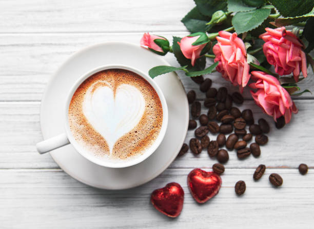 istock A cup of coffee with heart pattern on a table 1203363361