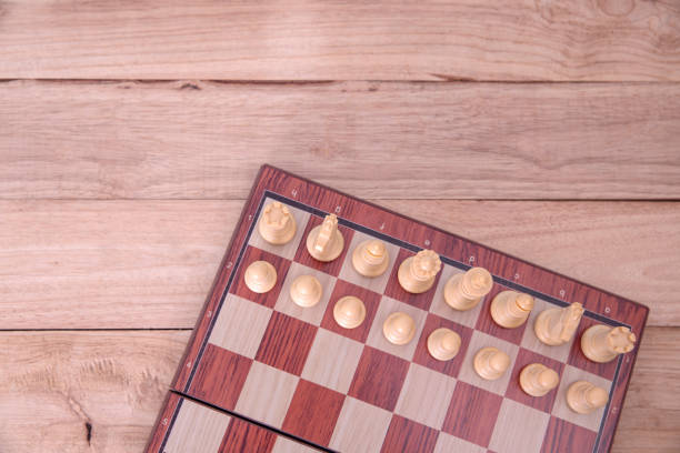 istock Chess game in competition success play, concept strategy and successful management or leadership 1203364451