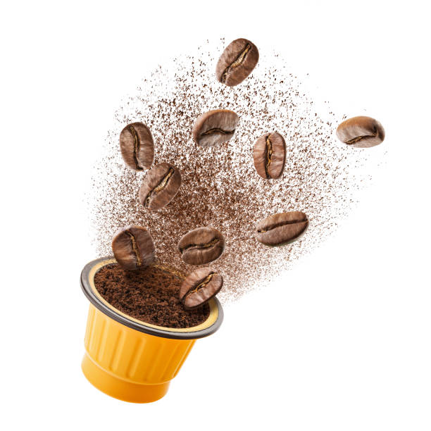 istock Exploded view of coffee grinder with roasted beans and leaves 1203365482