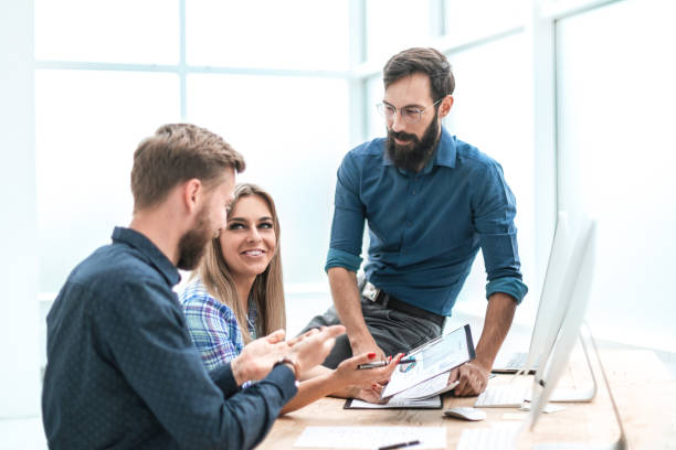 istock close up. business team discussing financial data 1203366750
