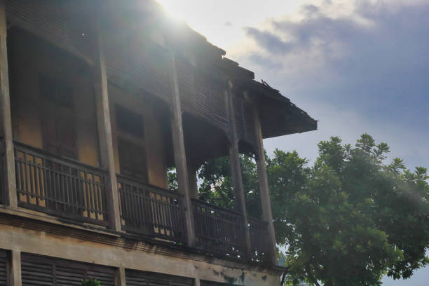 istock Old wooden house and sun light. 1203368218