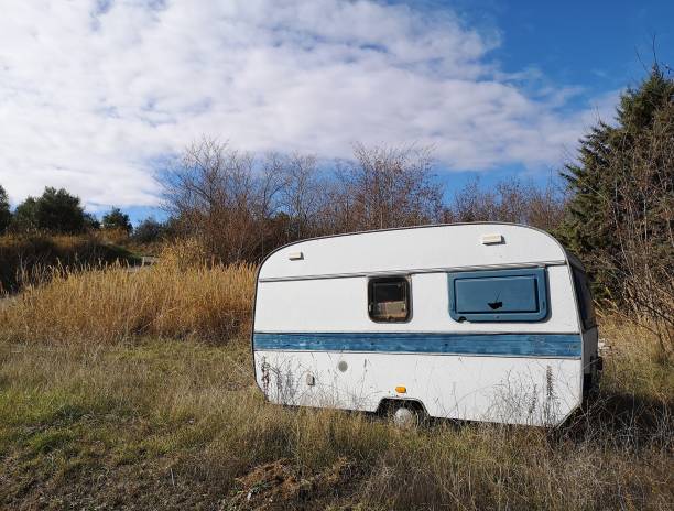 istock old caravan abandoned in the countryside 1203369439