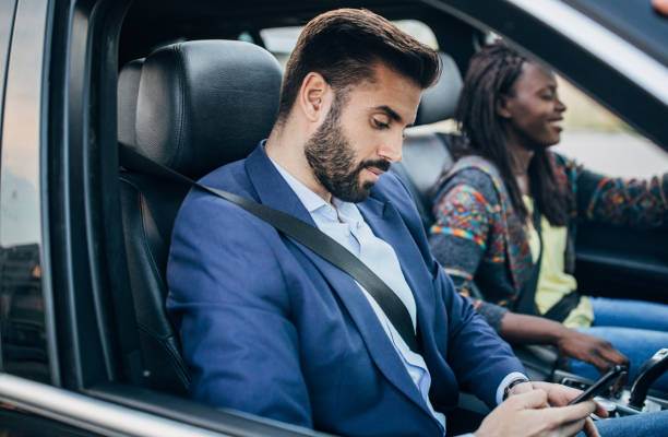 istock People driving in the car 1203370911