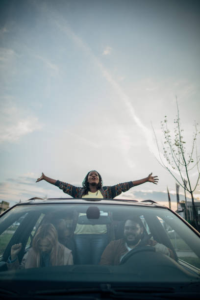 istock Friends having fun on a road trip 1203371782