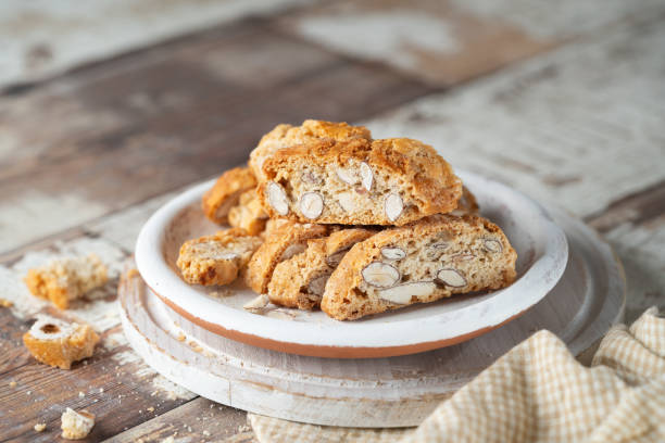 carquinyolis, a typical pastry of catalonia, spain on rustic background with copy space. - biscotti imagens e fotografias de stock