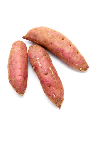 istock japanese sweet potatoes on white background 1203374269