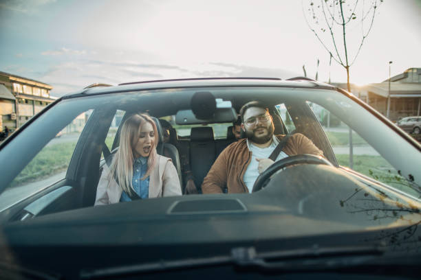 istock Friends in a car 1203375530