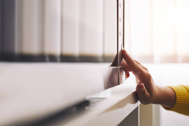 istock Close up of woman using a microwave 1203380990