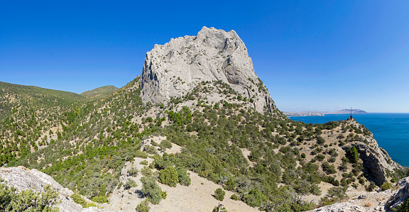 Crimea. View of Mount Sokol (Kush-Kaya) from Novyy Svet. Sunny day in September.
