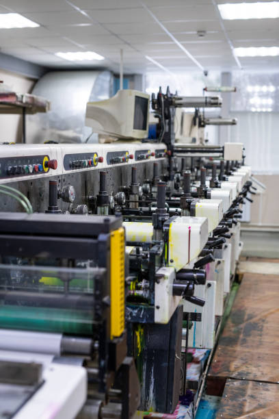 istock Powerful printing press at factory 1203385116