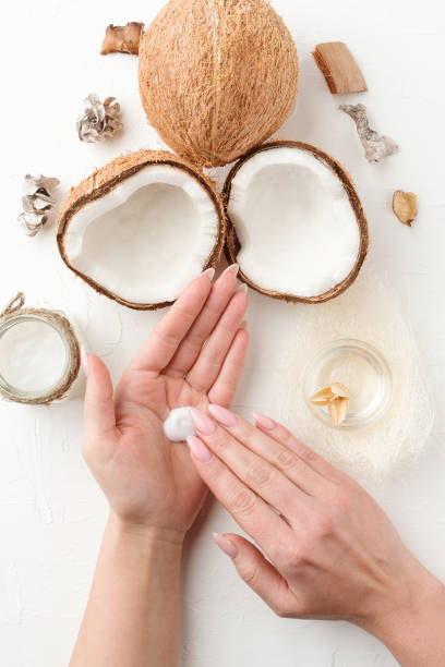 istock Skin care with organic coconut cosmetics background. 1203385156