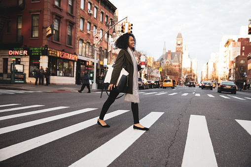 Successful and elegant woman walks the streets of New York