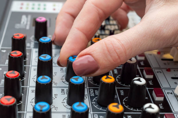 sound engineer working on audio mixer. close up. - human finger sound mixer music producer imagens e fotografias de stock