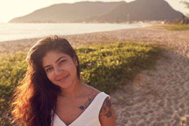 istock Woman at the beach 1203389034