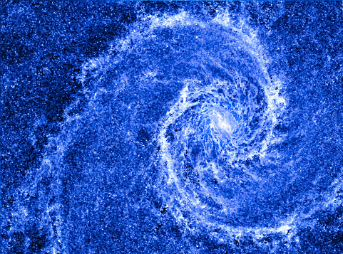 Spiral galaxy in the universe. Space swirl background. Blue perfect galaxy like geometric golden ratio. Concept of harmony and Fibonacci sequence in nature. Elements of this image furnished by NASA.