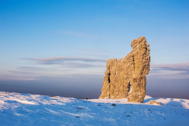 istock Weathering posts on the Manpupuner plateau, Russia 1203393221