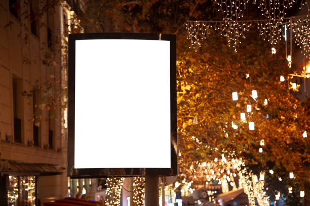istock Blank billboard on night street 1203396618