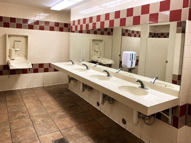 public restroom - urinal clean contemporary in a row imagens e fotografias de stock
