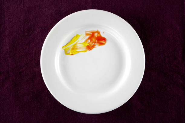 istock Plate with mustard and ketchup stains 1203397832
