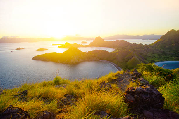 Panoramic view of majestic Padar Island during magnificent sunset Panoramic view of majestic Padar Island during magnificent sunset pulau komodo stock pictures, royalty-free photos & images