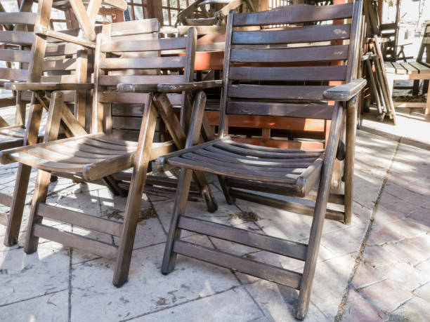 istock Wooden chairs in the city 1203403823