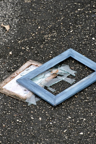 Broken picture frame on street