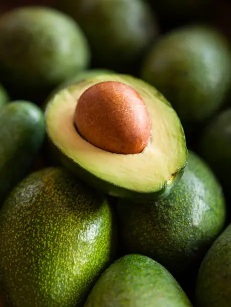 Close up view of halves of an avocado