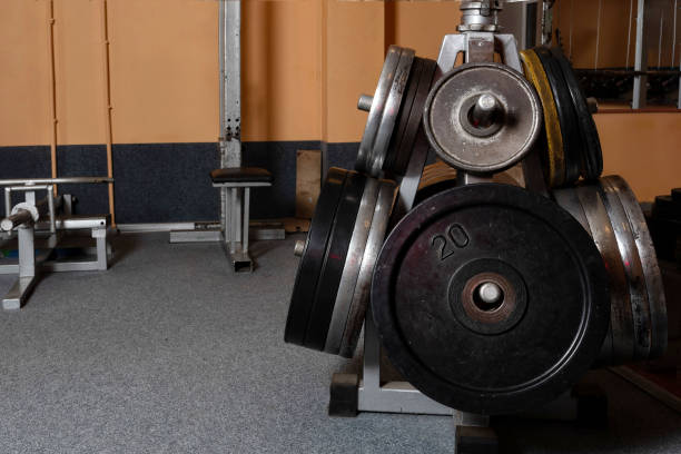istock Barbell plates holder rack in the gym - Image 1203427869