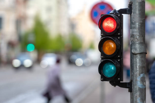 istock A city crossing with a semaphore. Red light in semaphore - image 1203429808
