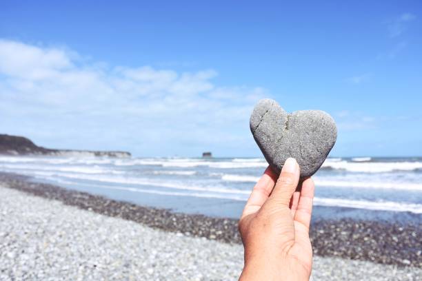 istock Vintage Heart Shaped Stone Beach Landscape 1203429987