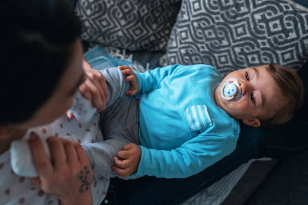 istock Mother playing with baby 1203433740