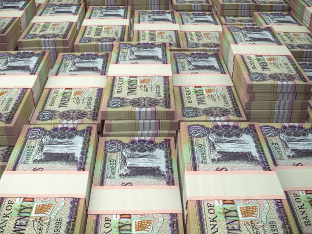 istock GYD. Guyana currency background. Guyana dollars banknotes. Georgetown 1203433900