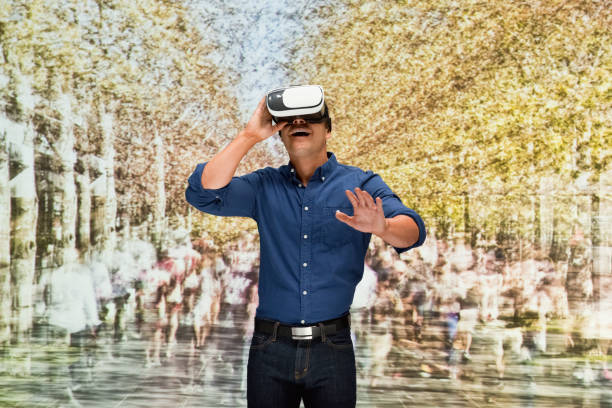 istock Young male in blurred motion who is outdoors and using augmented reality 1203435207
