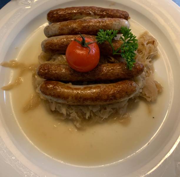 istock Sausages with sauerkraut 1203437081