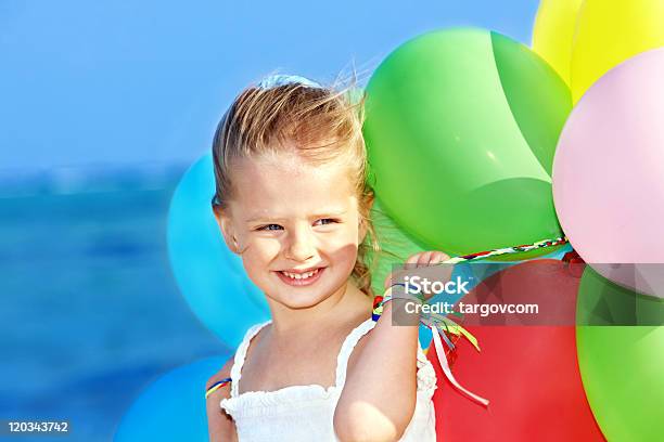 Child Playing With Balloons Stock Photo - Download Image Now - Balloon, Beach, Beach Party