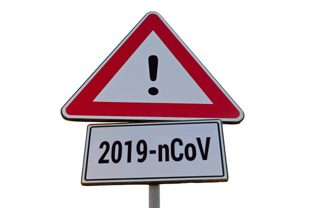 istock Attention warning alert road sign with text 2019-nCoV isolated 1203437981