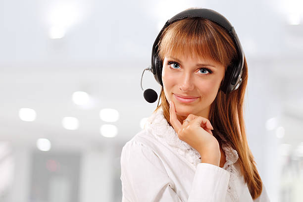 istock Support phone operator beautful young woman in headset at workplace 120343830