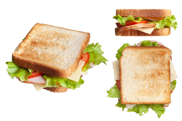 istock Fresh sandwich with ham, cheese and green salad. isolated on white background 1203440134