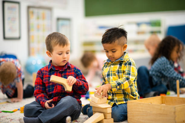 istock Multi-Ethnic Preschool Boys Playing with Blocks stock photo 1203446159