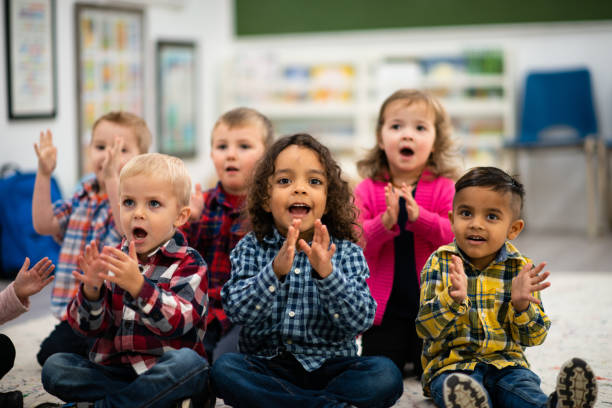 istock Multi-Ethnic Preschool Sing-Along Time stock photo 1203446160
