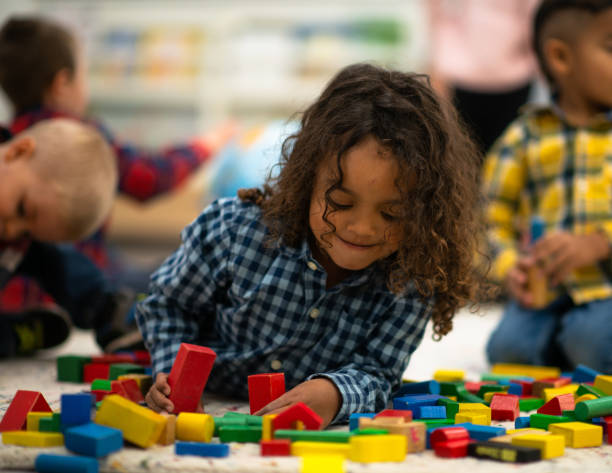 istock Mixed Race Boy Building with Blocks stock photo 1203446191