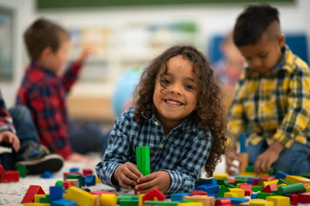 istock Mixed Race Boy Building with Blocks stock photo 1203446231