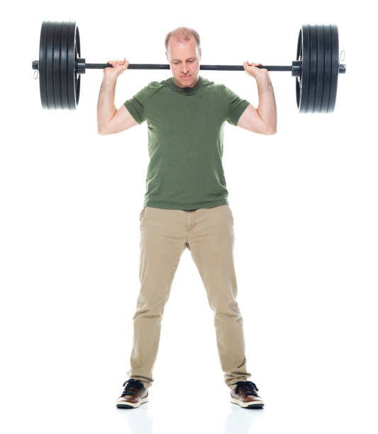 istock Mid adult exercising and being active with body building 1203449549