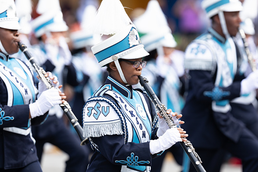 Indianapolis, Indiana, USA - September 28, 2019: The Circle City Classic Parade, Members of the Jackson State University cheerleaders and marching band performing at the parade