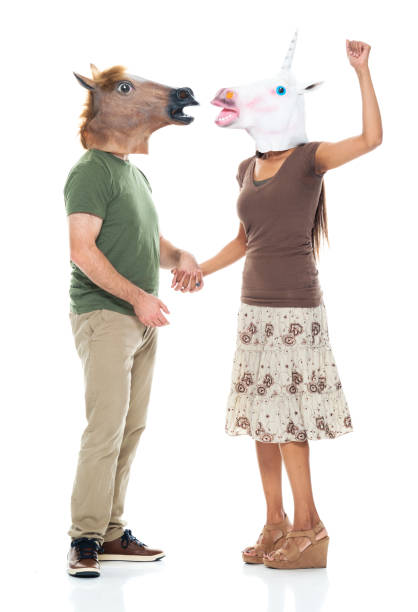 istock Girlfriend standing wearing horse costume 1203450662