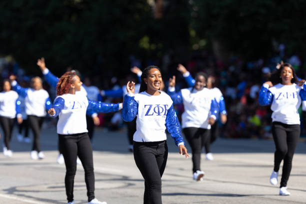 Circle City Classic Parade Indianapolis, Indiana, USA - September 28, 2019: The Circle City Classic Parade, Members of Zeta Phi Beta Sorority dancing during the parade sorority photos stock pictures, royalty-free photos & images