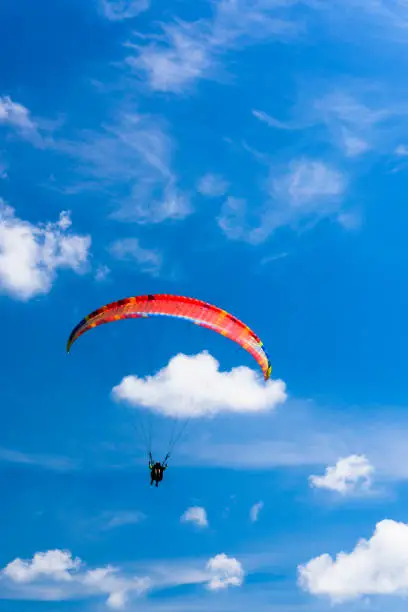 Paragliding extreme Sport with blue Sky and clouds
