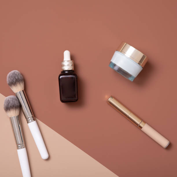 istock Modern flat lay collection with cosmetics on light beige background for lifestyle design. Cosmetic and beauty product. Skin care luxury cosmetics concept. 1203481874