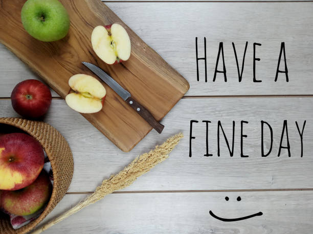 istock Have a Fine Day. With fresh fruit arrangement on white wooden table background. 1203481936